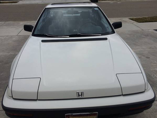 Illustration for article titled For $4,000, This 1988 Honda Prelude S Tells Your Luggage To Rack ‘Em Up